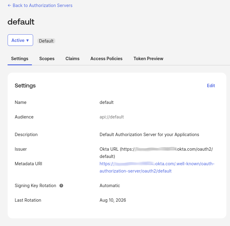 Settings for the active default authorization server, showing an issuer ending in /oauth2/default with the organization hostname obscured